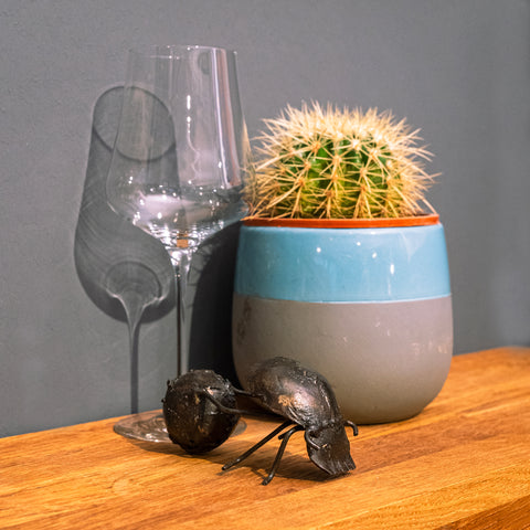 Metal sculpture dung beetle