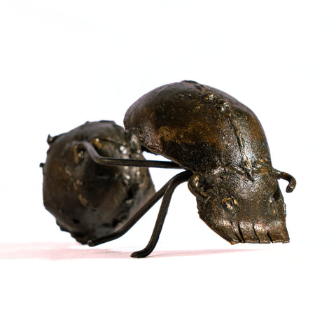 Metal sculpture dung beetle