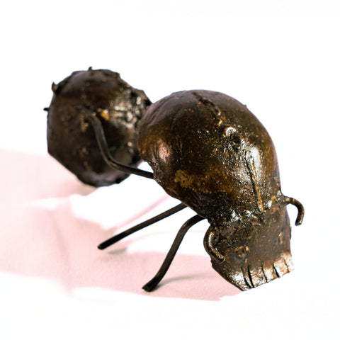 Metal sculpture dung beetle